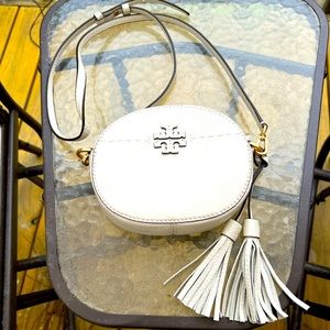 Tory Burch ivory leather round crossbody bag. Gently used  3 times.